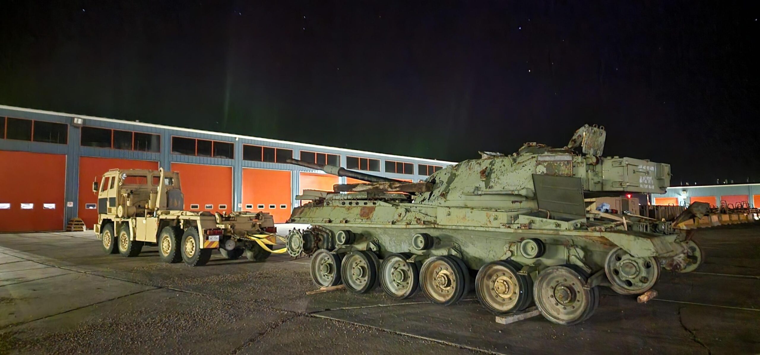 A Chieftain tank during restoration at night